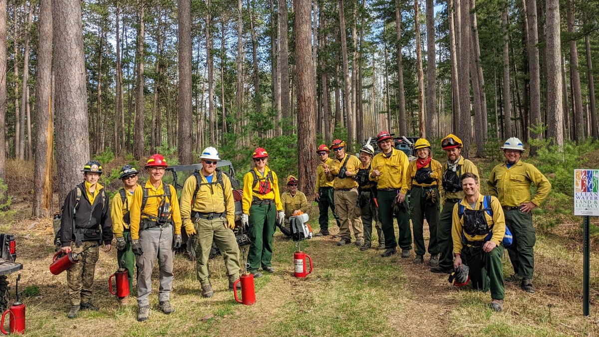 A mix of tribal, federal, University, and non-governmental fire practitioners gather before prescribed fire ignitions on the Camp 8 unit, May 17, 2022.